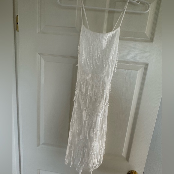 “Making Magic White Fringe Lace-Up Mini” dress from Lulus - Picture 6 of 9